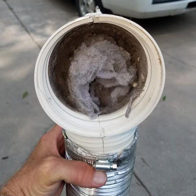Clogged Dryer Vent with Debris and Lint